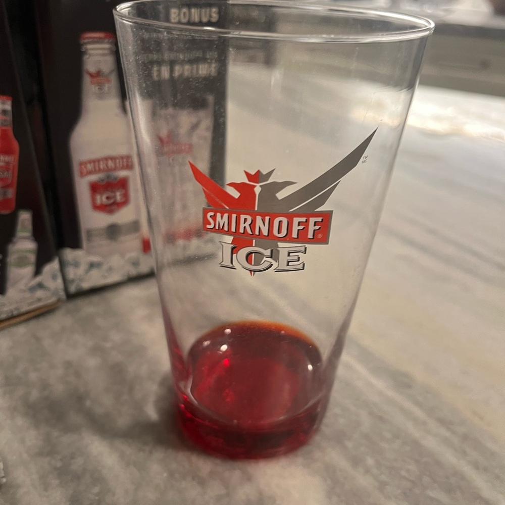 12 Smirnoff, ice, glasses, and one extra